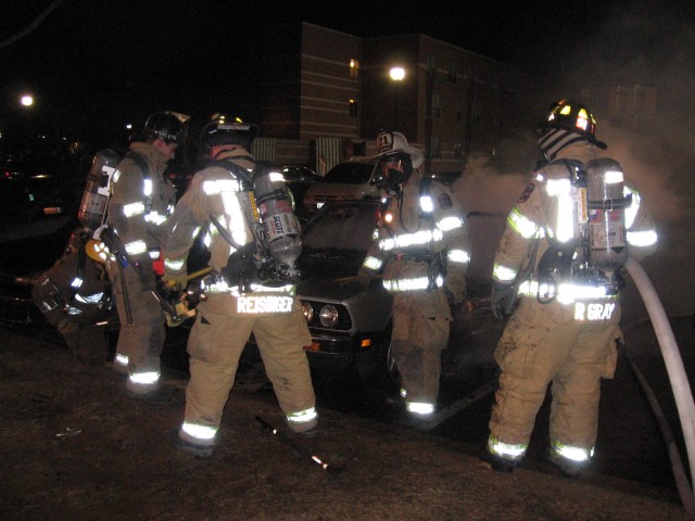 (L-R): Bob Fraser, Terry Reisinger, Greg Paxson, and Randy Gray at car fire in Lincoln University.